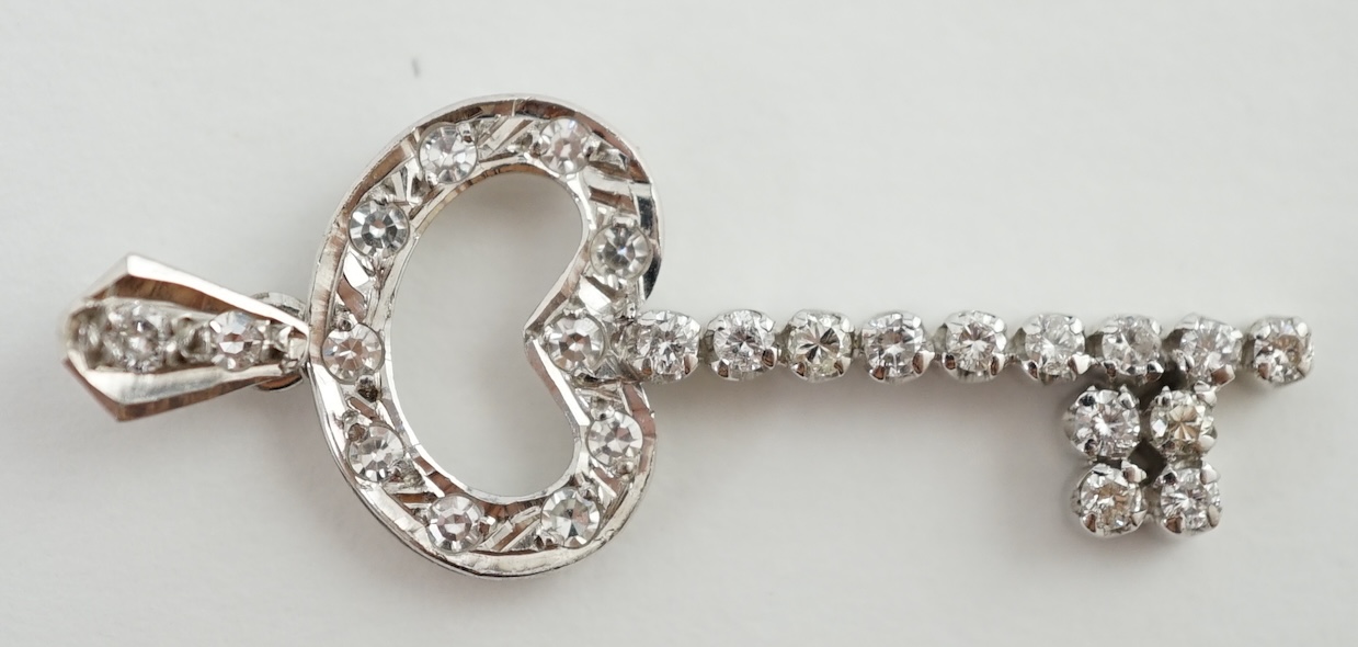 A mid 20th century Egyptian white gold and diamond cluster set 'key of the door' pendant